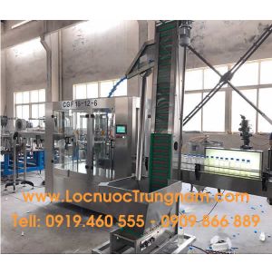 Dây chuyền chiết rót tự động chai pet 3 trong 1 .công suất 4000 chai/h